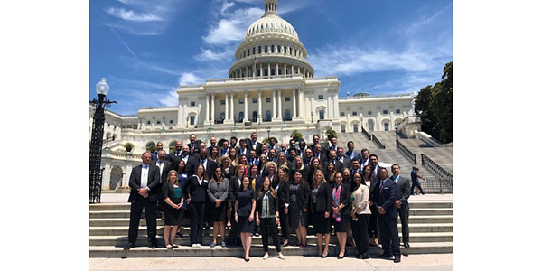OMBA students in front of the capital steps