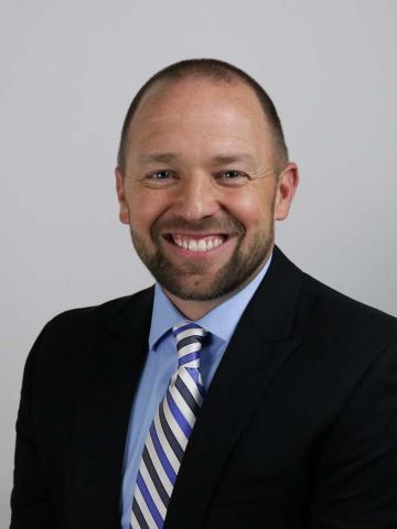 Headshot of Matt Quade smiling