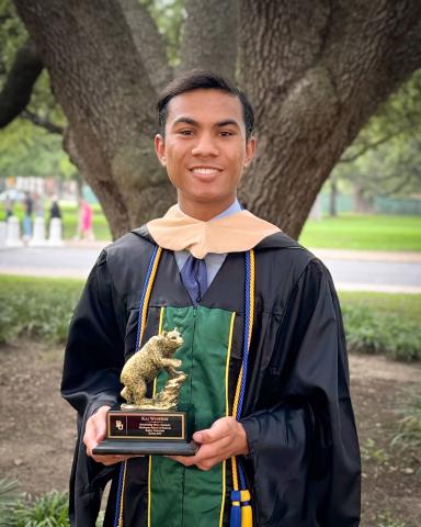 Kai Winfree with award