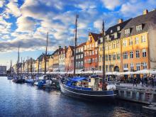 Houses and boats on river in Copenhagen, Denmark