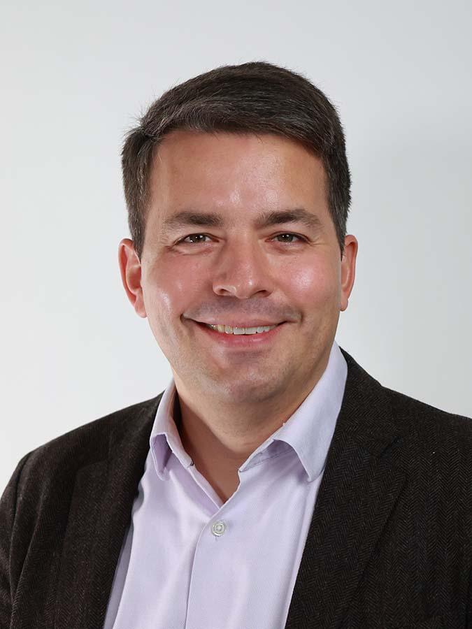 Headshot of Clayton Featherstone