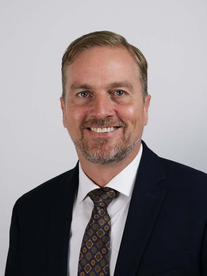 Headshot of Matthew Douglas