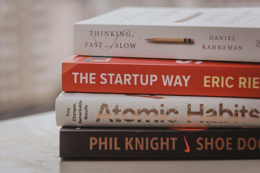 4 business books stacked