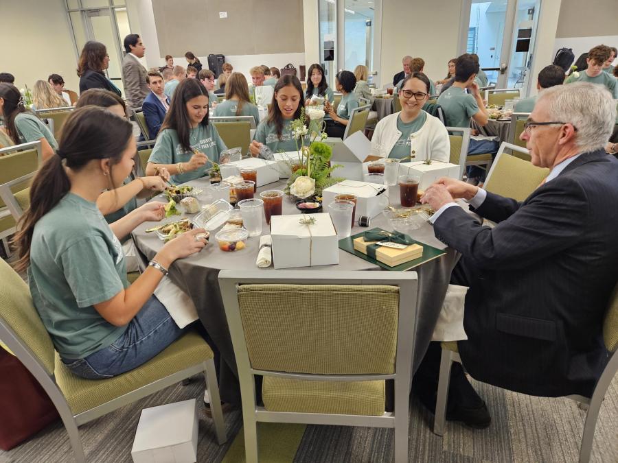 Baylor students at a lunch banquet with faculty and staff