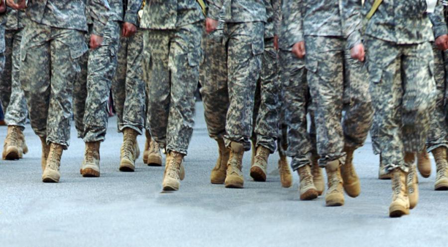 Soldiers' boots on the ground walking