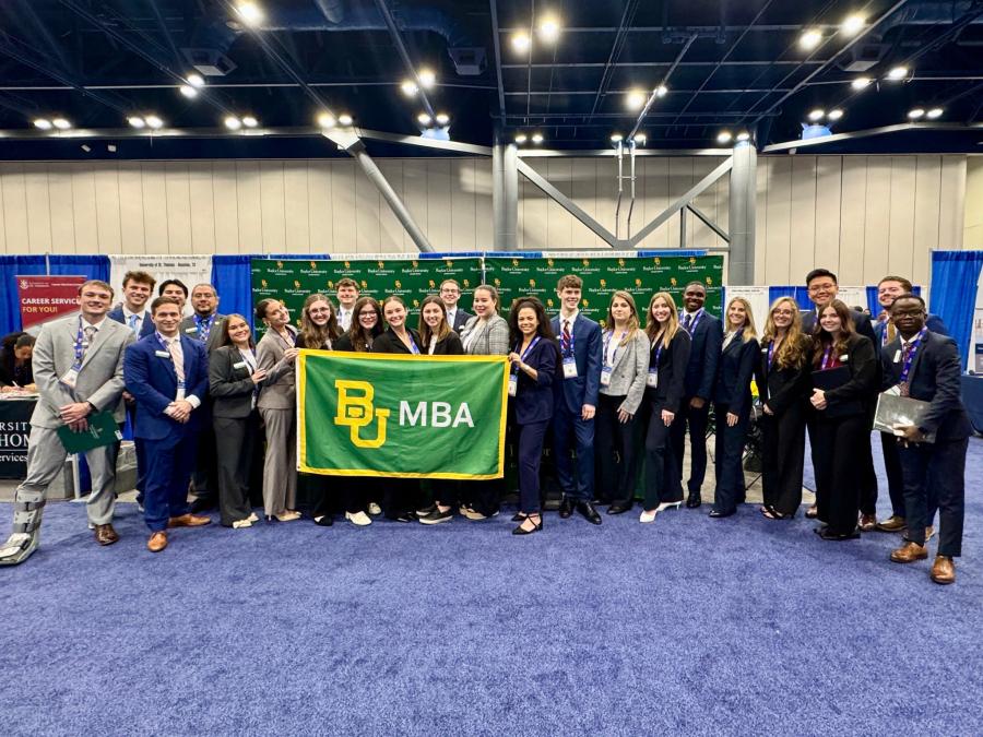 MBA students holding Baylor MBA flag at National Black MBA Association (NBMBAA) Career Fair 2025